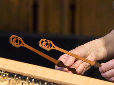 Hands making music.