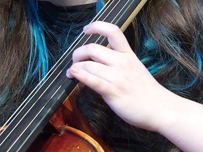 Hands making music.