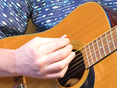 Hands making music.