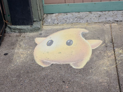 Beautiful work.  It rained that night, and it washed away.