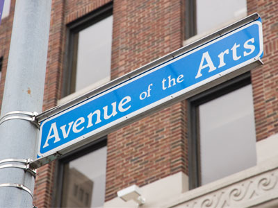 On the street where I work, the sidewalk is populated by musicians, actors and dancers.
