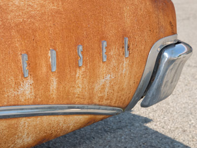 I thought this rusty 1960 Edsel was a junk car, but then somebody got in, noisily started it up and drove away.