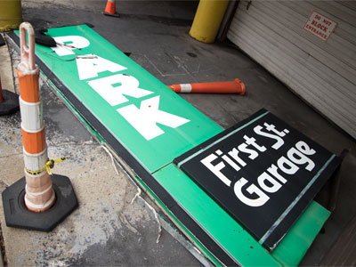 The dangerous sign has been taken down from my parking garage (see December 23 above).