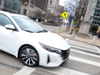 The car that nearly ran me over today (see November 13, 2024).  Note the crosswalk signal.