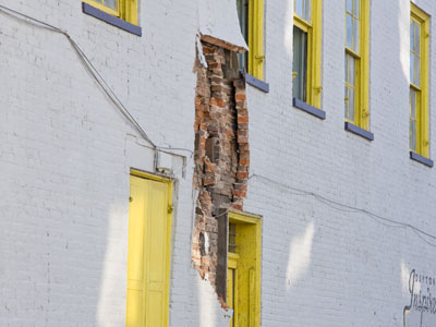 The only thing holding this wall together was the paint.