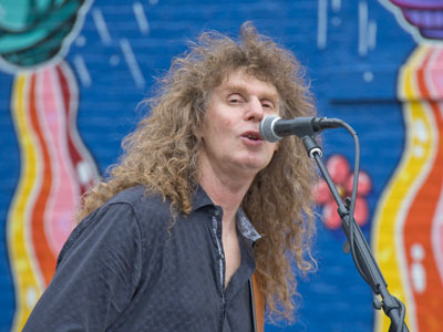 How not to get rich:  sing songs on the street.