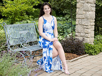 You can`t see that her toenails matched the blue dress.