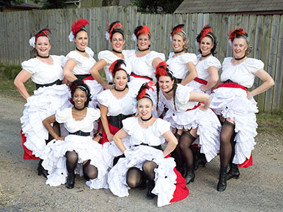 The German festival features French can-can dancers (see August 13, 2021, and August 12, 2022).