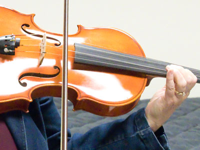 No, it`s not a violin.  This is the bigger sibling, a viola.