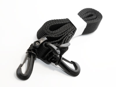 The lens is pretty big and comes with its own strap.