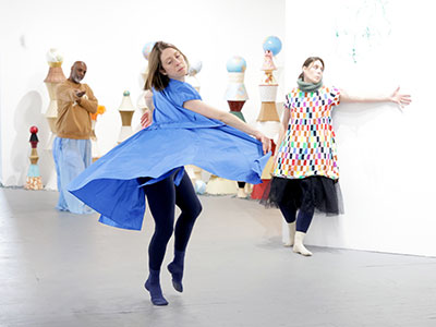 Rodney Veal, Megan Flynn and Teresa VanDenend Sorge rehearse for a dance performance.