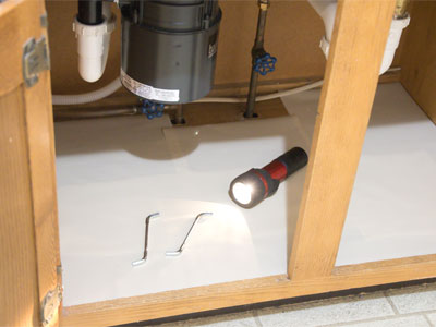 I found a YouTube video that told me how to fix the disposal (see January 19 above and June 5, 2022).